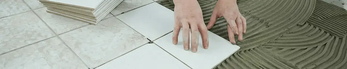 Professional installing white tile floors in Tuscaloosa, AL