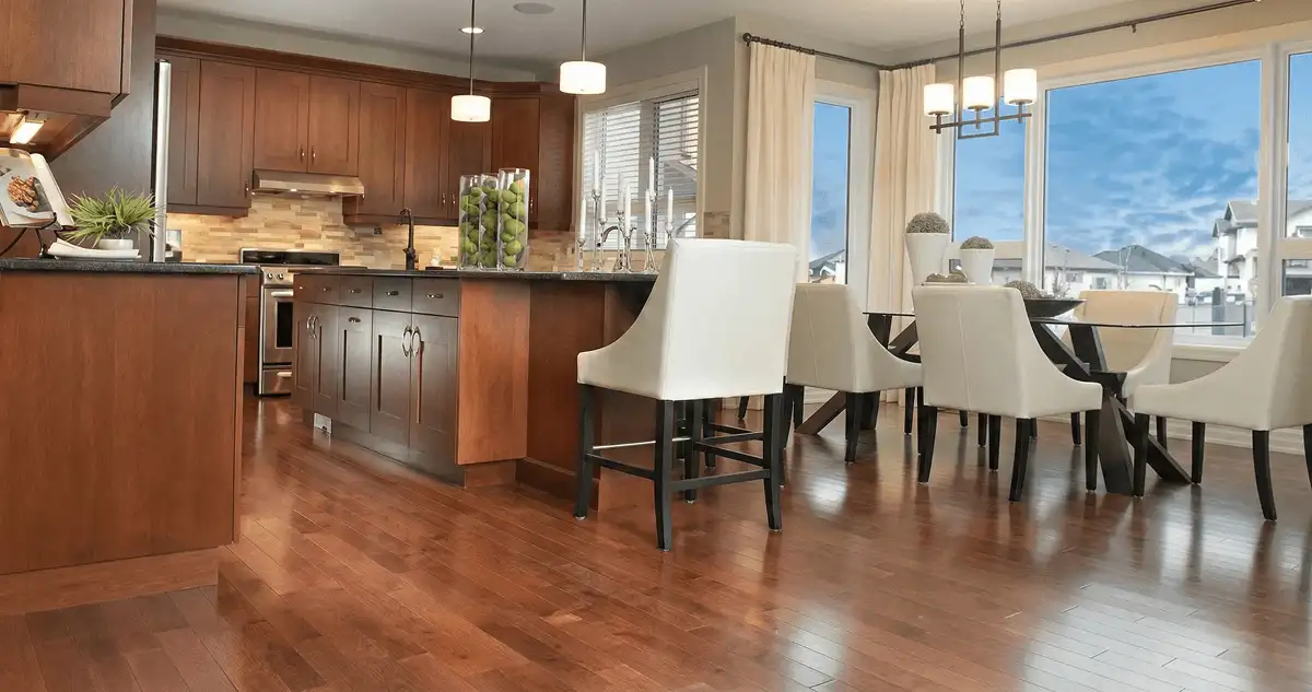 A modern kitchen with professionally installed wood flooring in Tuscaloosa, AL